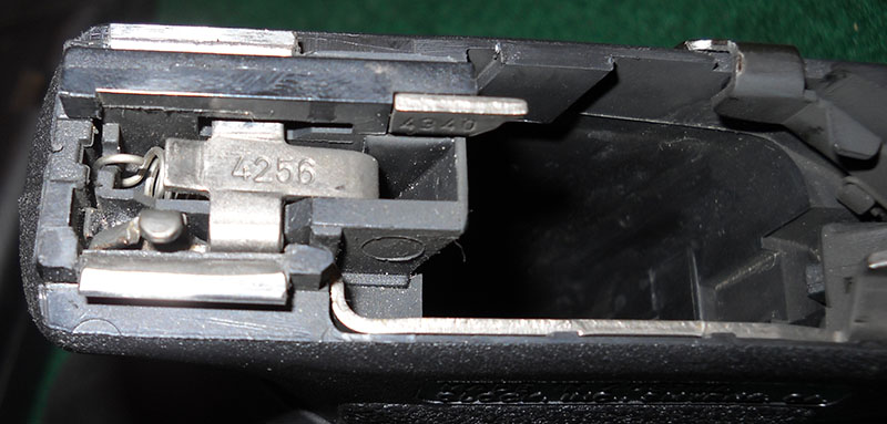 detail, Glock 21 frame interior, abaft magazine well
